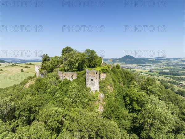 Aerial view of the Hegau volcano and the ruins of MÃ¤gdeberg castle, on the horizon the Hohenhewen,