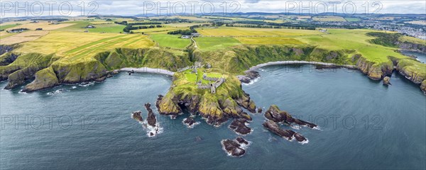 Aerial panorama of Dunnottar Castle ruins on the North Sea coast, Stonehaven, Aberdeenshire,