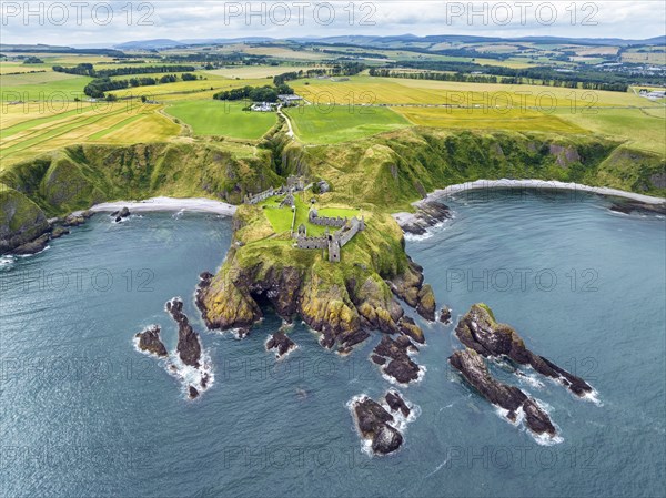 Aerial view of Dunnottar Castle ruins on the North Sea coast, Stonehaven, Aberdeenshire, Scotland,