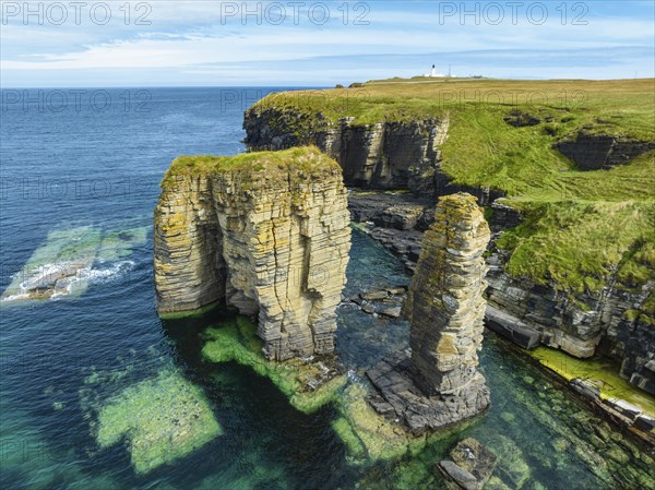 Aerial view of rock towers, surf pillars on the North Sea coast near Wick, County Caithness,