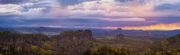 View of the Schrammstein chain, the Falkenstein and the Lilienstein from the Carolafelsen, Bad