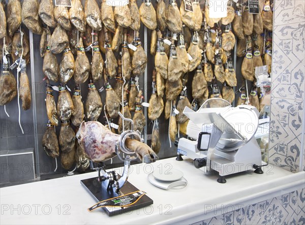 Close up display of cured hams inside a specialist shop in Barrio Macarena, Seville, Spain, Europe