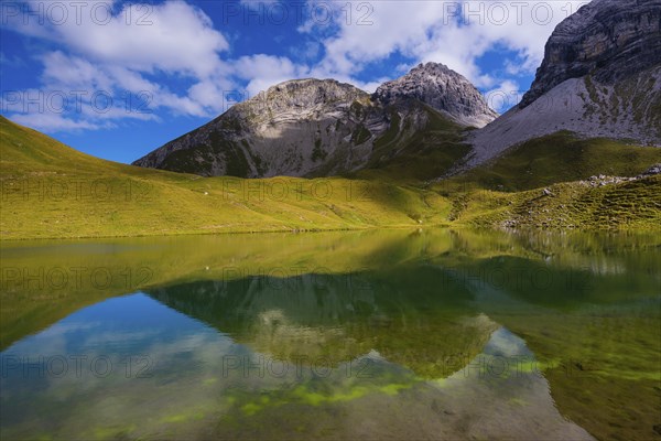 Rappensee, behind it Linkerskopf, 2459m, Rotgundspitze, 2485m, and Hochgundspitze, 2459m, AllgÃ¤u