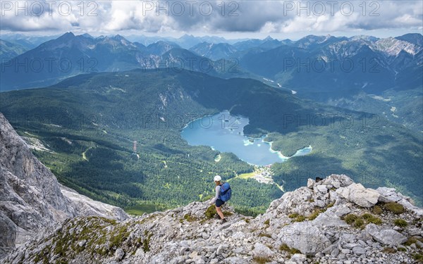 Mountaineer at Waxenstein, Eibsee lake, Wetterstein Mountains, Garmisch-Patenkirchen, Bavaria,