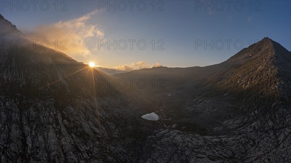 Aerial view of sunrise at Lake MÃ¤rjelen between Eggishorn and Strahlhorn on the Aletsch Glacier,