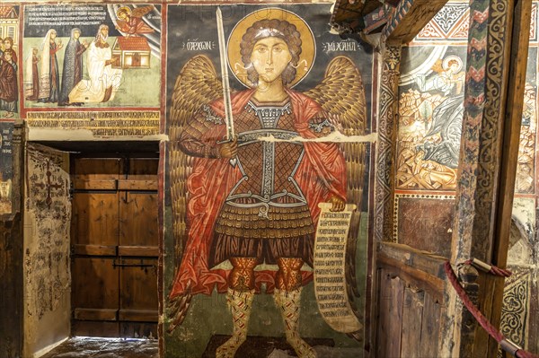 The painted interior of the barn-roofed Church of Archangelos Michail or Church of St. Michael the