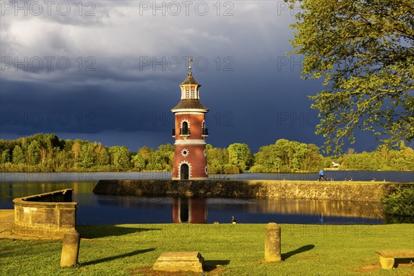 Lighthouse at the Fasanenschlösschen in Moritzburg with thunderstorm sky