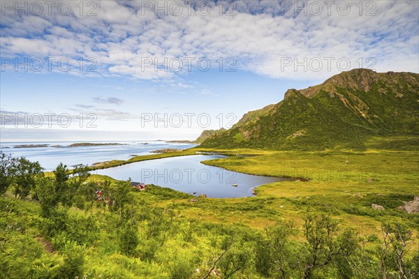 Coast with mountains and lake, near Nyksund, Dronningruta hike, Langoya Island, Vesteralen,