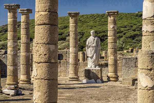 Trajan statue and basilica of the Roman ruins of Baelo Claudia in Bolonia, Tarifa, Costa de la Luz,