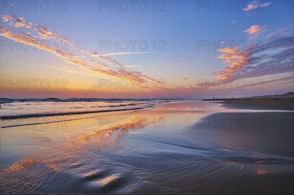 Atlantic ocean after sunset with surging waves at Fonte da Telha beach, Costa da Caparica,