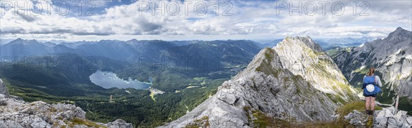 Alpine panorama, hiker, view of Eibsee lake and Werdenfelser Land, Wetterstein Mountains,
