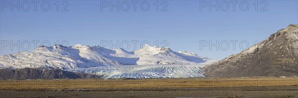 Aerial view over ice tongue Falljökull in winter, one of many outlet glaciers of Vatnajökull, Vatna