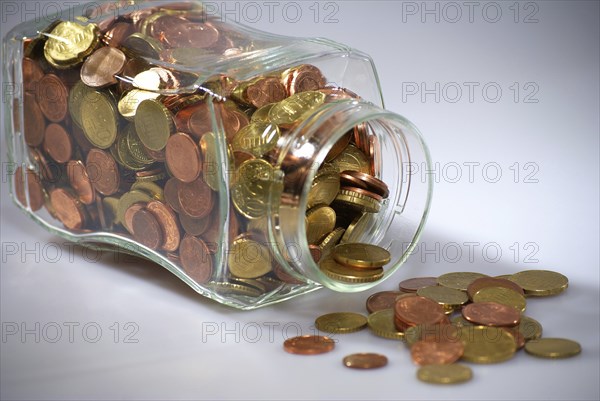 Euro coins in a jar
