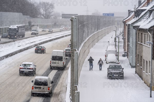 A40 motorway, onset of winter, lots of fresh snow and daytime temperatures below minus 5 degrees,