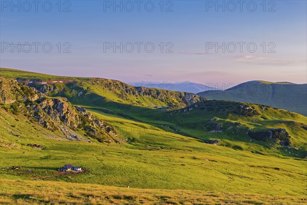 View of the mountains of the Transylvanian Alps in the southern Carpathians from a height in the