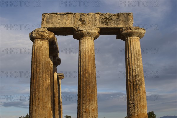 Archaic Temple of Apollo, Doric columns, Imposing ancient columns and architecture against a cloudy