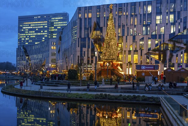 Christmas market, at the Kö-Bogen shopping centre, in the city centre of Düsseldorf, at the back