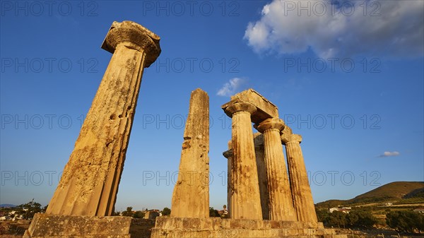 Archaic Temple of Apollo, Doric columns, Doric columns of antiquity illuminated by the warm evening