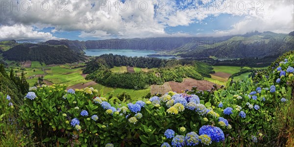 Panoramic view of the picturesque crater landscape of the Caldeira das Sete Cidades with the lake