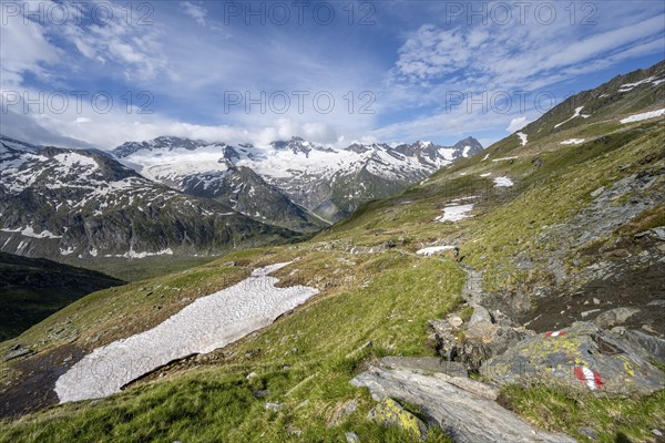 Hiking trail in picturesque mountain landscape, mountain peaks with snow and glacier Hornkees and