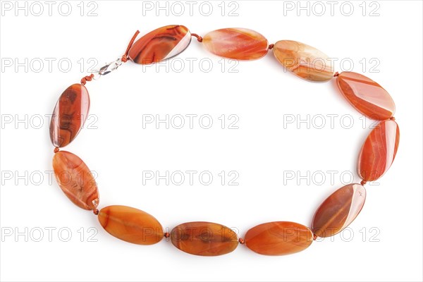 Colored onyx beads isolated on white background. top view, close up