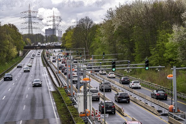 Weighing and barrier system on the A42 motorway, in front of the dilapidated motorway bridge over