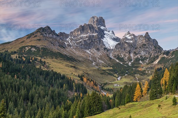 Autumn forest in front of the large Bischofsmütze, sunset, Gosaukamm, Dachstein mountains,