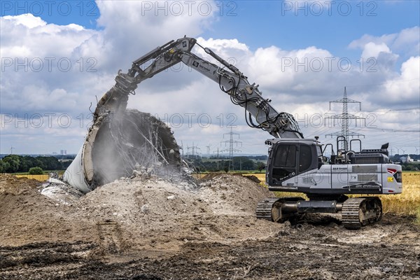 Demolished tower of a 20 year old wind turbine, in the Werl wind farm, 5 old Enercon E-66 turbines