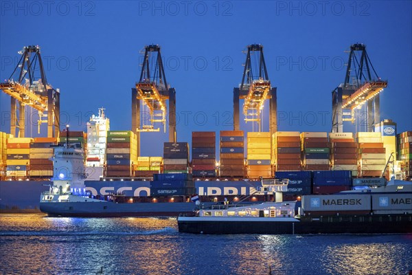 Container ship of the shipping company Cosco Shipping, CSCL SATURN, being loaded and unloaded,