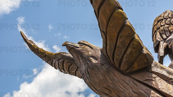 Sculpture of an eagle by Dayton Scroggins carved from tree trunk damaged by Hurricane Katrina on