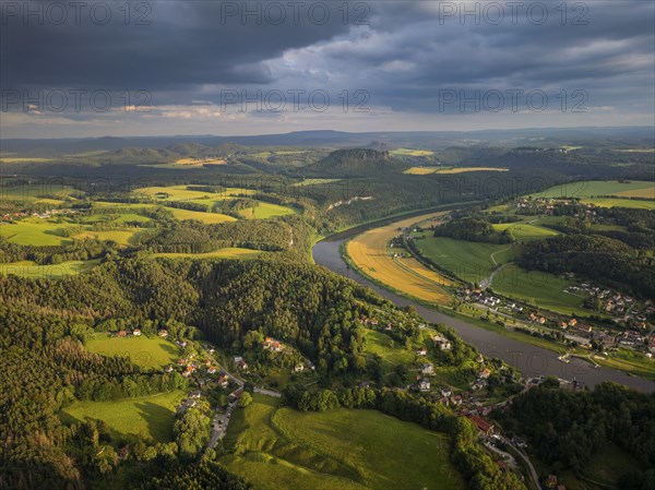 Sandstone cliffs in the Rathen area. View of the Lilienstein over the Elbe valley, Saxon