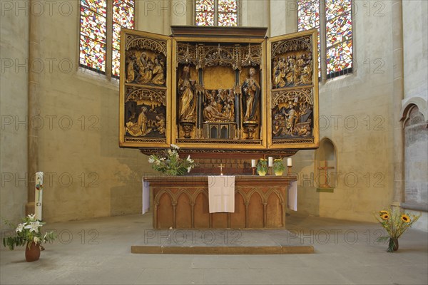 Gothic high altar by Linhart Könbergk 1492 with sculptures, colourful stained glass windows,