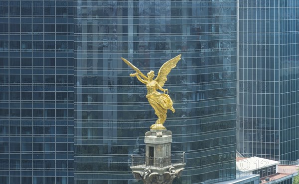 Mexico City tourist attraction Angel of Independence column near financial center and El Zocalo