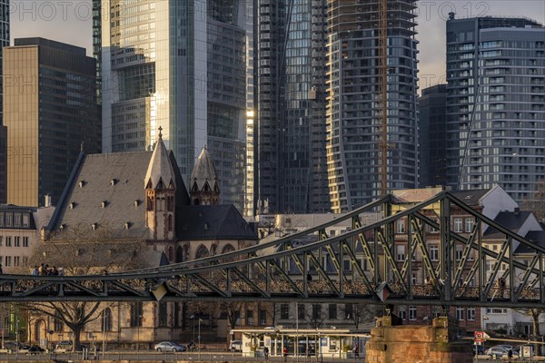 Skyline of the city centre of Frankfurt am Main, river Main, Eiserner Steg bridge, dusk, Hesse,