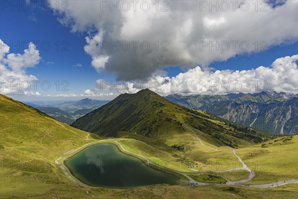 Riezler Alpsee, an artificial lake, snow pond, feeds the snow cannons that completely cover the