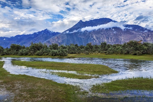 Panorama of Himalayas and landscape of Nubra valley on sunset. Hunber, Nubra valley, Ladakh, India,