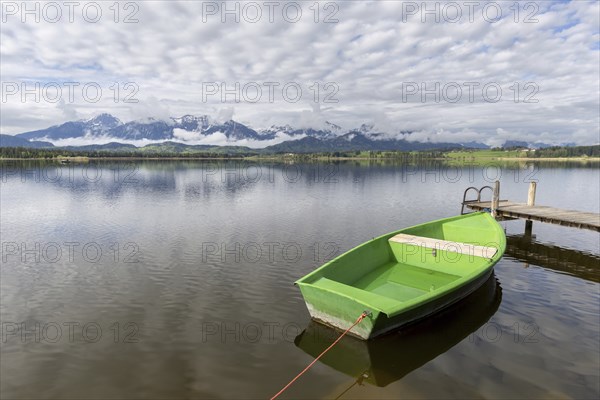 Rowing boat at sunrise, Hopfensee, Hopfen am See, near Füssen, OstallgÃ¤u, AllgÃ¤u, Bavaria,