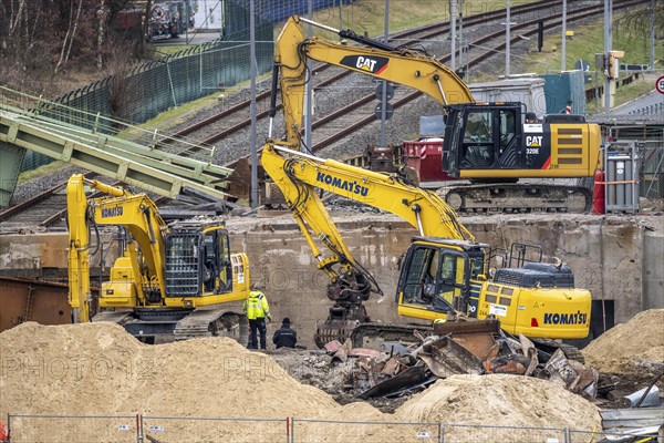 Construction site in the harbour, excavators working on a new harbour basin overpass, Bremerhaven,