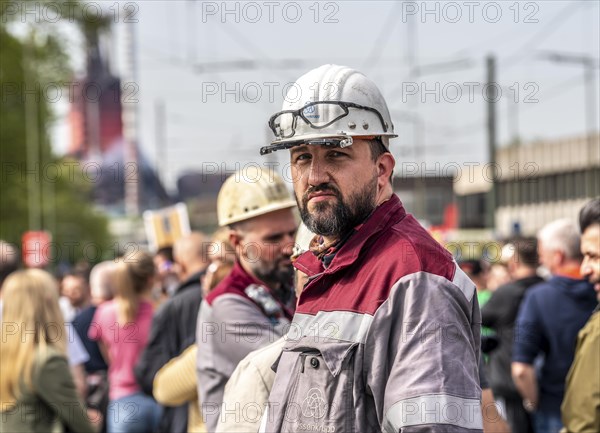 Steelworkers at a demonstration in front of the headquarters of ThyssenKrupp Steel Europe in