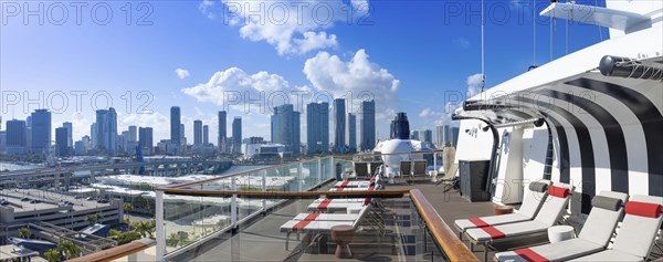 USA, Miami harbor panoramic skyline from cruise ship departing to Caribbean vacation, North America