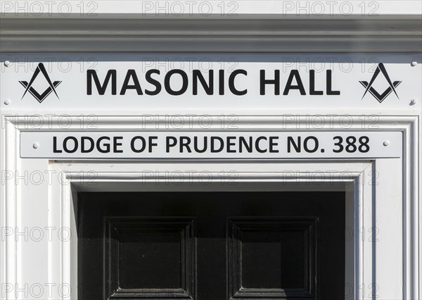 Sign above doorway entrance to Masonic Hall, Lodge of Prudence number 388, Halesworth, Suffolk,