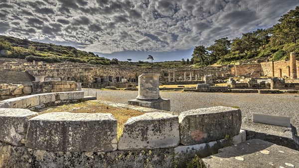 HDR, Super wide angle, View of an ancient exedra, under a cloudy sky, Kamiros, Archaeological site,