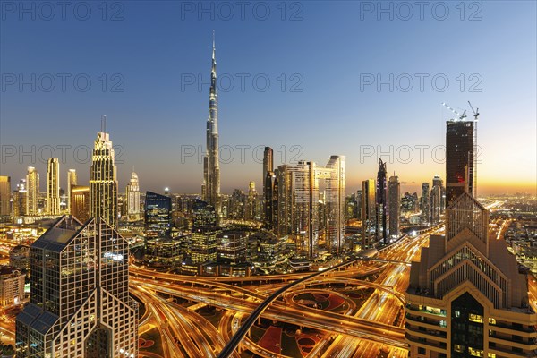 Burj Khalifa skyline tallest building in the world from above in Downtown at night in Dubai, United