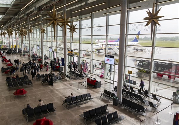 Departure lounge aircraft boarding area inside Tirana International Airport Nënë Tereza, Mother