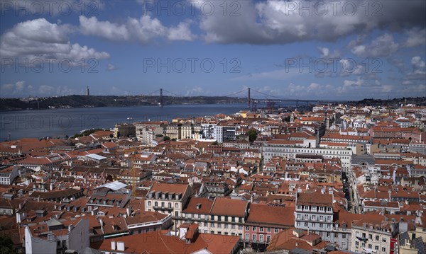 View from Castelo de Sao Jorge to old town, city view, river Rio Tejo, bridge 25 de Abril, Lisbon,