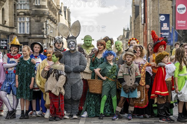 Group of actors, characters from Shrek, world's largest cultural festival The Fringe, High Street,