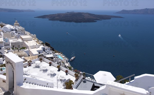 View over the island capital Fira, also Thira, located on the crater rim, in the background