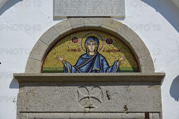 Cross-domed church of Diasososuan, close-up of a mosaic showing Mary with outstretched arms,