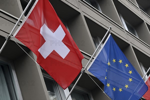Symbolic photo flags Switzerland and Europe