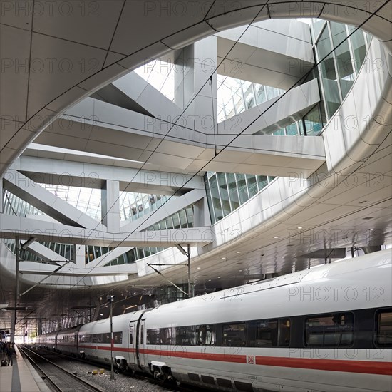 ICE at the centre platform with the large opening to the glass dome, long-distance train station,